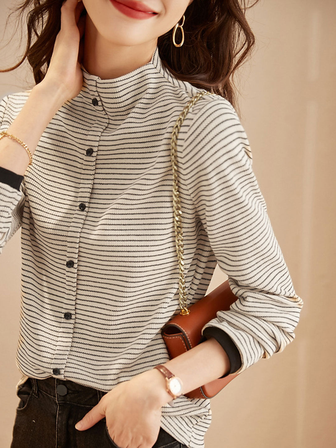 Top femme rayé en maille – col montant & design intemporel