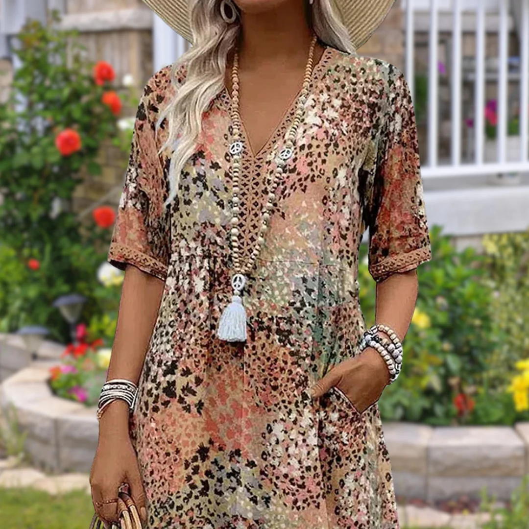 Robe d’été midi femme – Coupe fluide avec manches courtes et poches