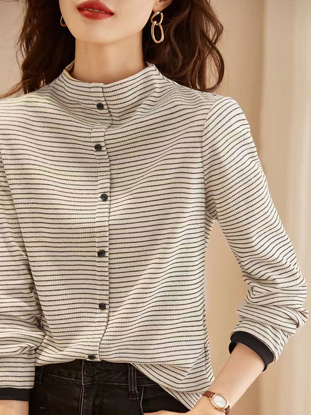 Top femme rayé en maille – col montant & design intemporel