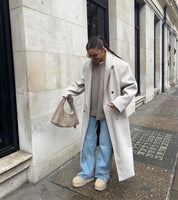 Manteau long oversize femme – col à revers et double boutonnage