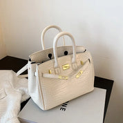 Sac à main chic femme – sac structuré effet croco avec détails dorés