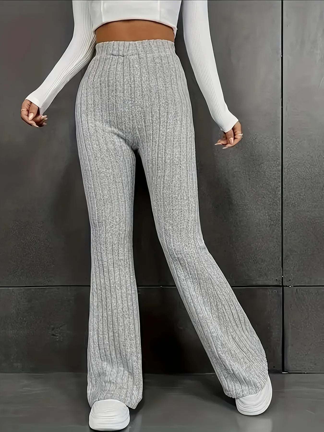 Pantalon femme taille haute slim fit flair en tissu côtelé stretch