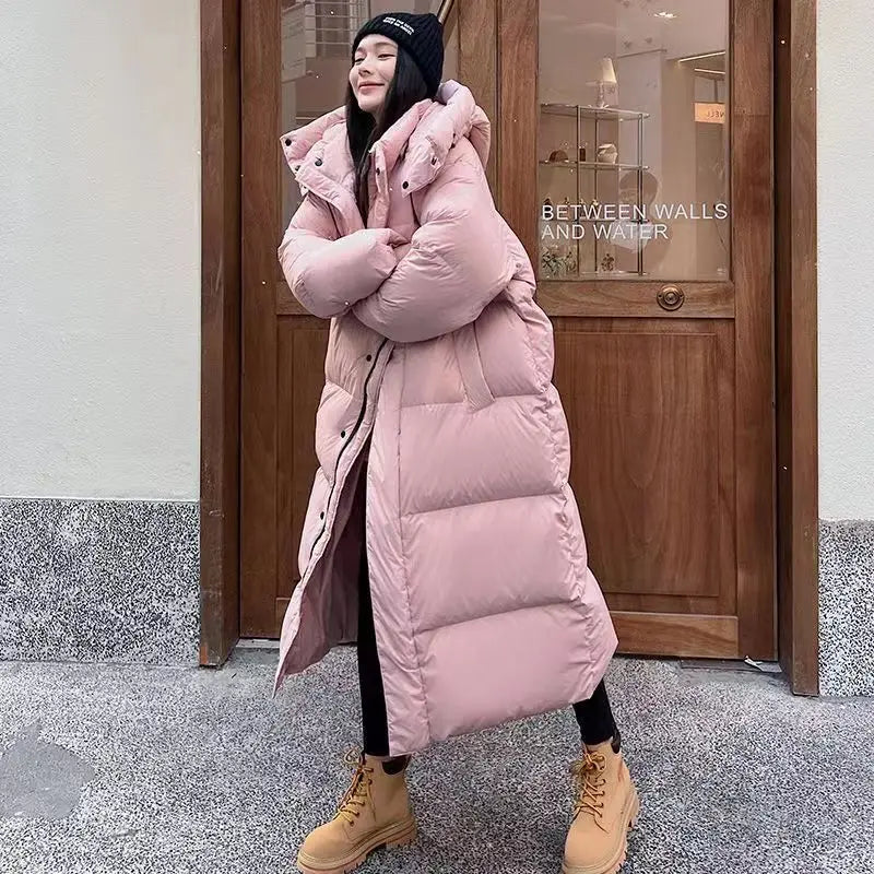Doudoune longue femme – Manteau matelassé chaud avec capuche & coupe décontractée | Jules Jij