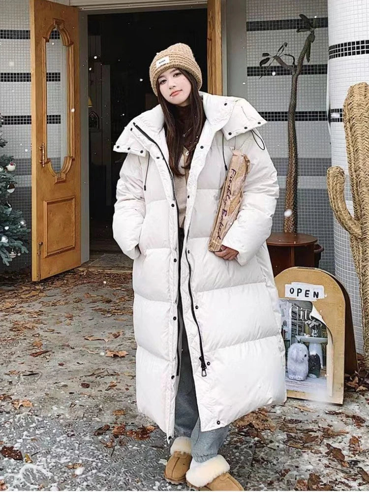 Doudoune longue femme – Manteau matelassé chaud avec capuche & coupe décontractée | Jules Jij