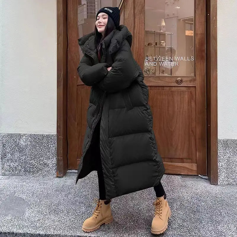 Doudoune longue femme – Manteau matelassé chaud avec capuche & coupe décontractée | Jules Jij