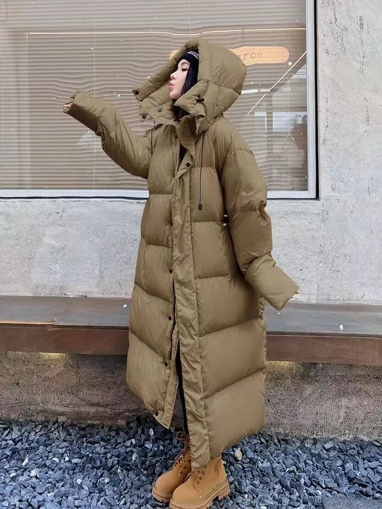 Doudoune longue femme – Manteau matelassé chaud avec capuche & coupe décontractée | Jules Jij